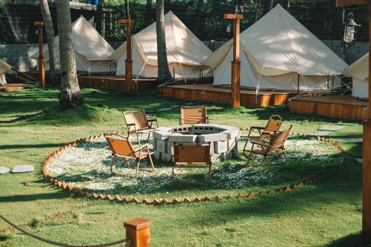 Kenyan Safari Camp with Tents and Cooking Fire